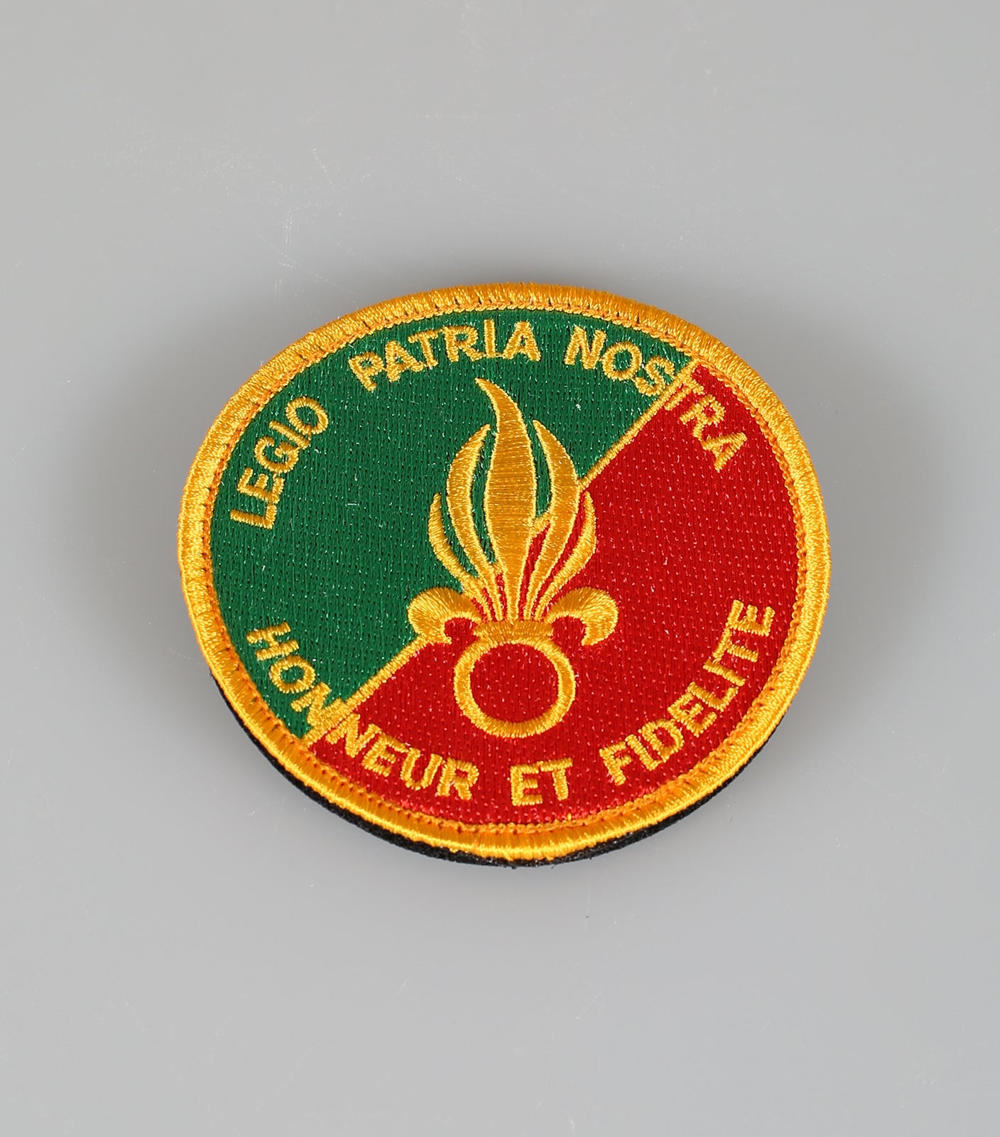 Round Green and Red Foreign Legion Badge